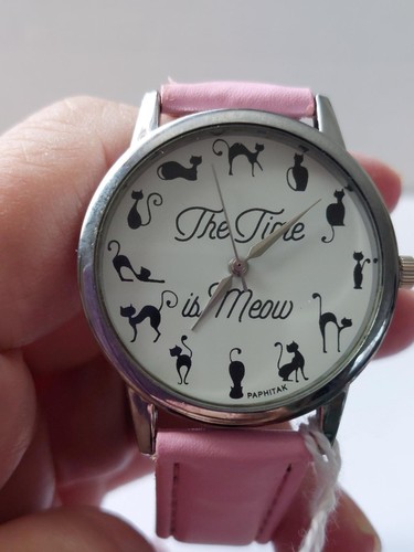 Cat design watch time is - cat,